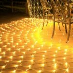 Instalatie Craciun Yoto, Tip Plasa, 1.5 m x 1.5 m, 120 LED-uri, Prelungitor 1.5 m, 8 Jocuri de Lumini, Interconectabila, Fir transparent, Interior/Exterior, Alb Cald